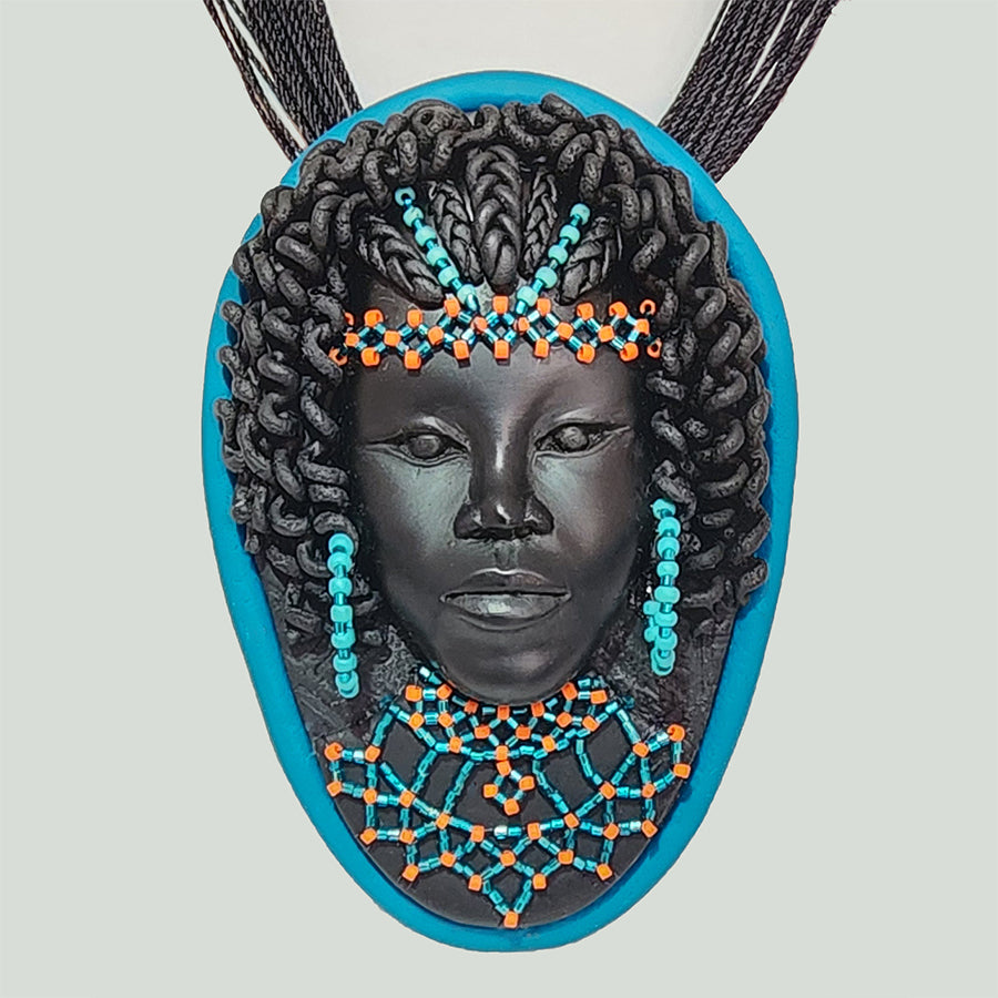 Turquoise Beaded Lady