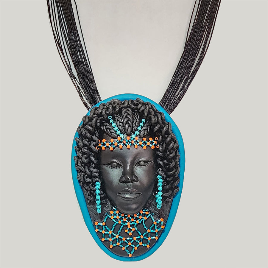 Turquoise Beaded Lady